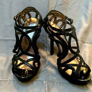 Black elegant heels by Calvin Klein.  Like new.